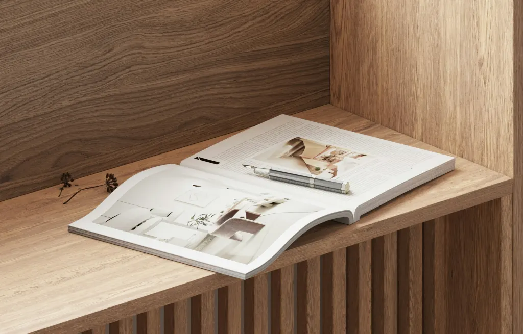 A wooden bench by the window