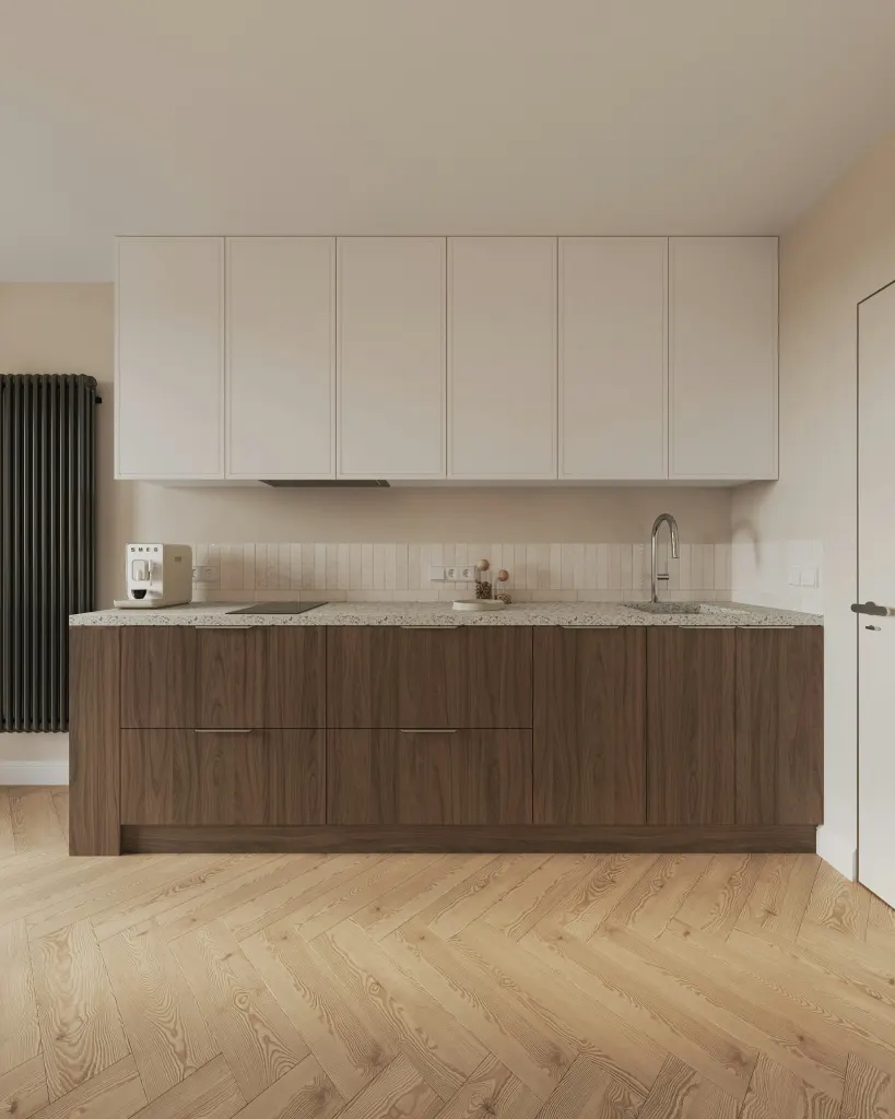 A kitchen with an oak floor and white fronts