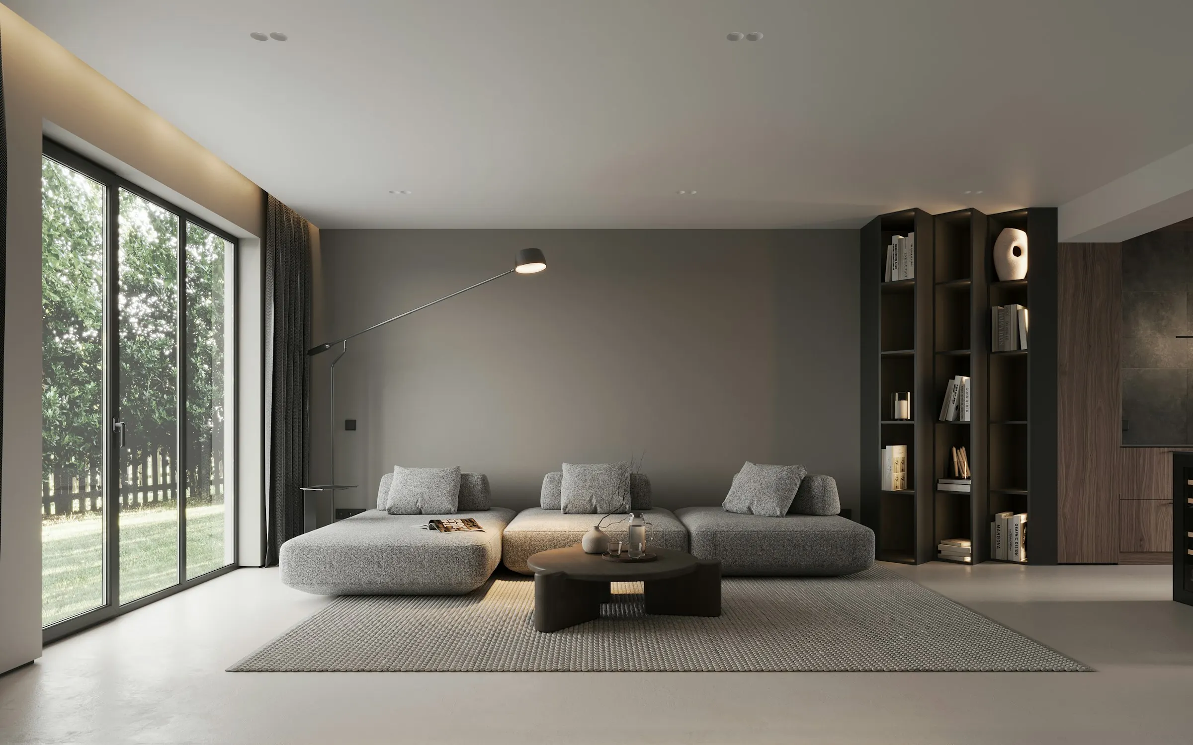 The living room of Floreasca Apartment, with large windows and a dark bookcase