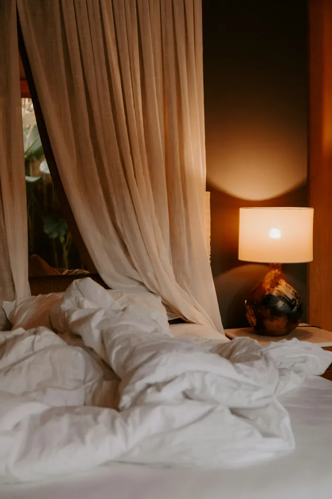 A bedroom in the evening