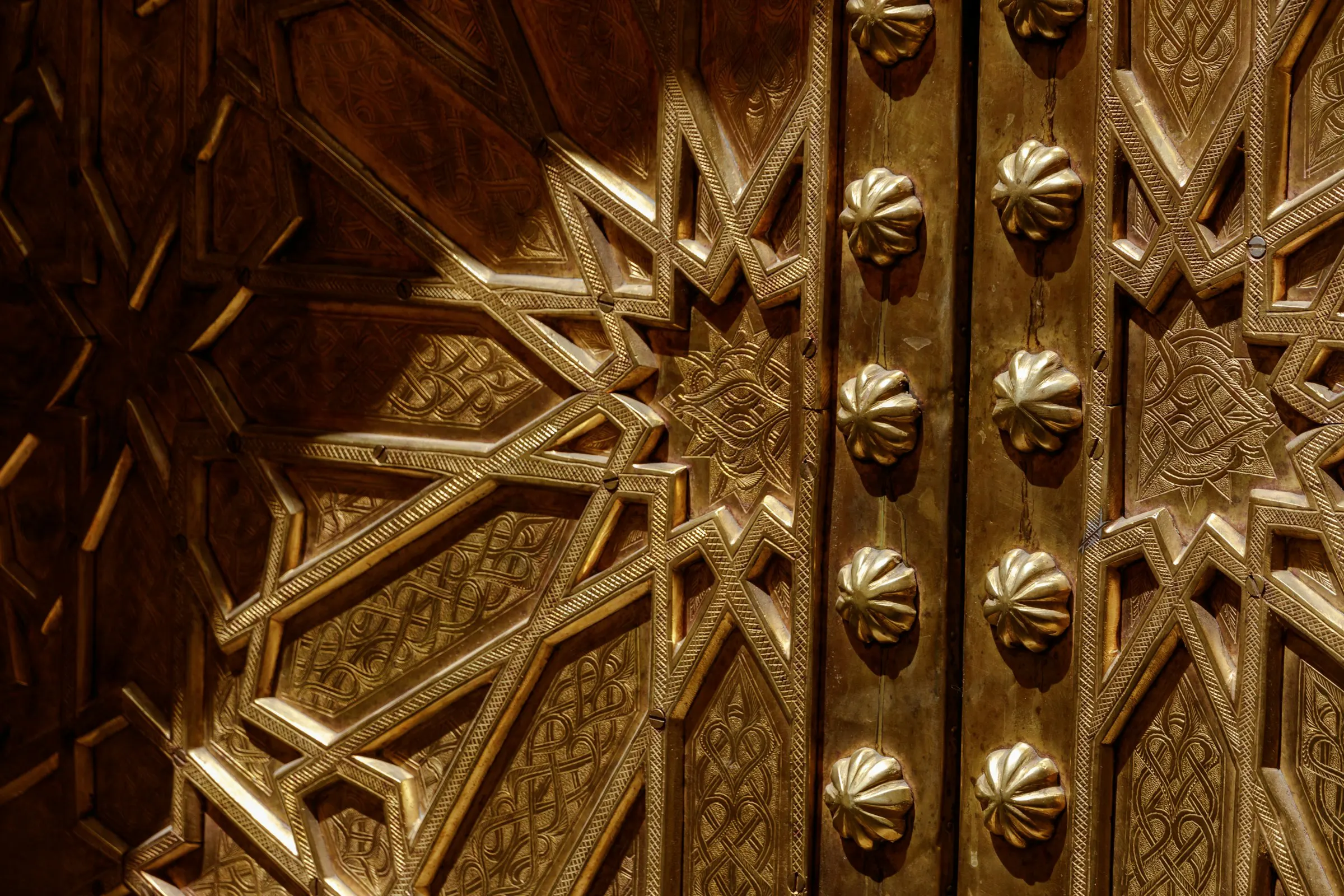A detail in patinated brass